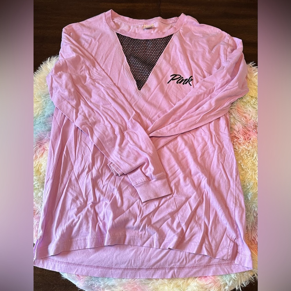L purple “pink” shirt with netting.